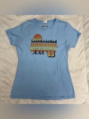 Netflix women’s ‘85 Hawkin’s Stranger Things graphic T shirt size S light blue